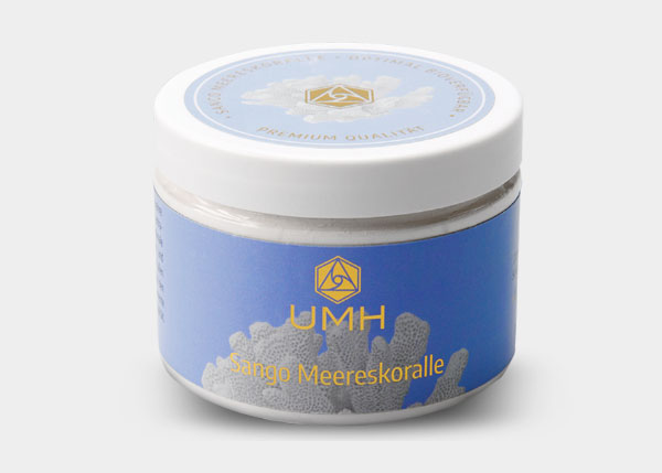Jar of cosmetic product with blue label and white lid on a light gray background